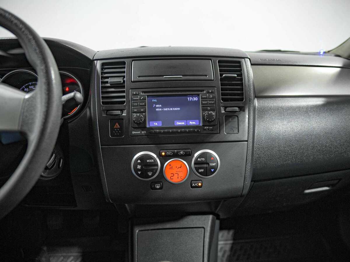 Nissan Tiida, 2010 Фото №11