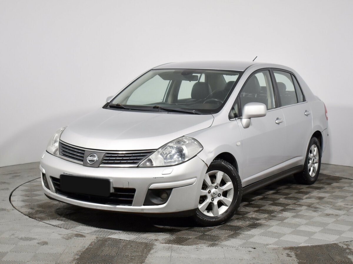 Nissan Tiida I, 2008 - 245 418 км. | Фото №1